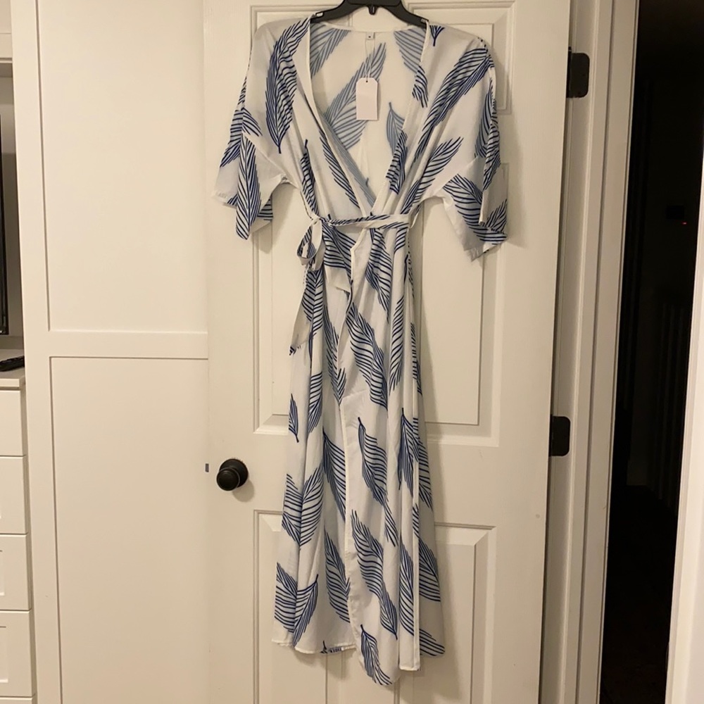 New white kimono style dress with blue leaves.